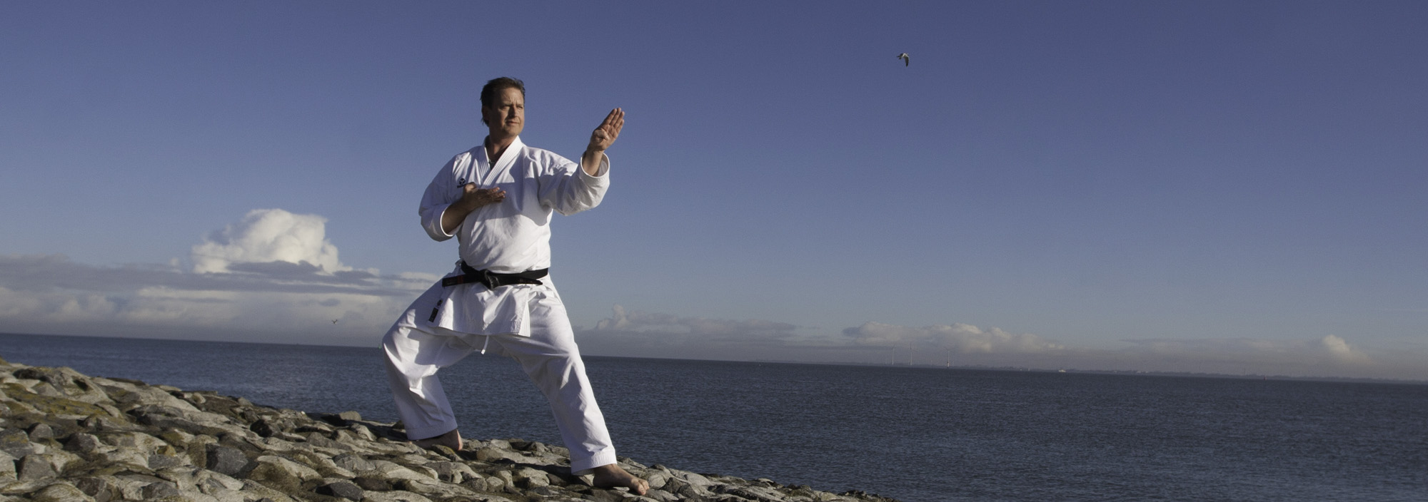 Two men practicing Brazilian Jiu Jitsu.