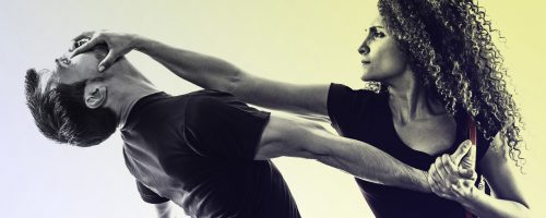 Two men practicing Brazilian Jiu Jitsu.